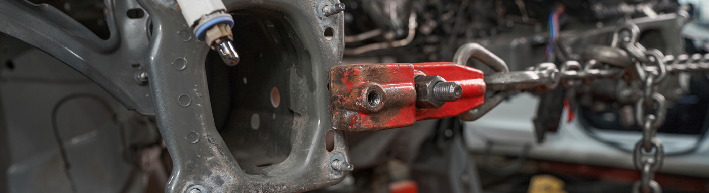 Auto Body and Collision Repair in Clio MI | Auto body repair technician restoring vehicle damage at Simms Body Shop Simms Body Shop collision repair facility in Clio MI